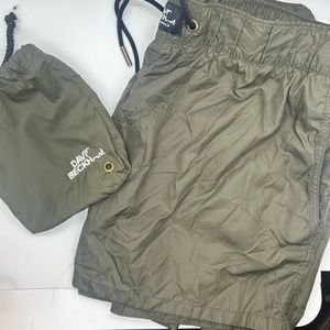 David Beckham size m swim trunks with carry bag